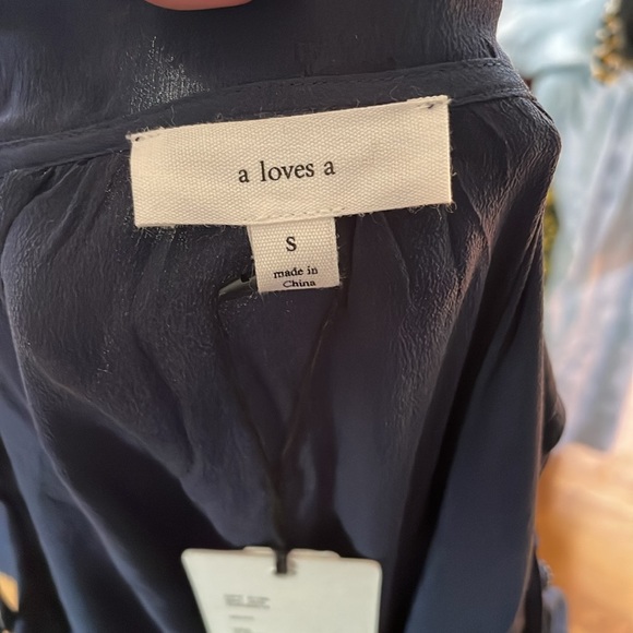 A loves a silk navy cold shoulder dress - NWT (one minor flaw) - Picture 8 of 8